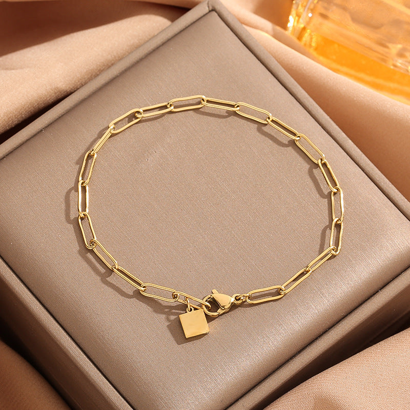 Simple Chunky Chain Bracelet With A Small Square Plate In A Japanese-Korean Style