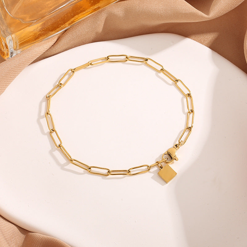 Simple Chunky Chain Bracelet With A Small Square Plate In A Japanese-Korean Style